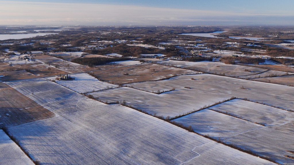 Snow-covered fields from the helicopter