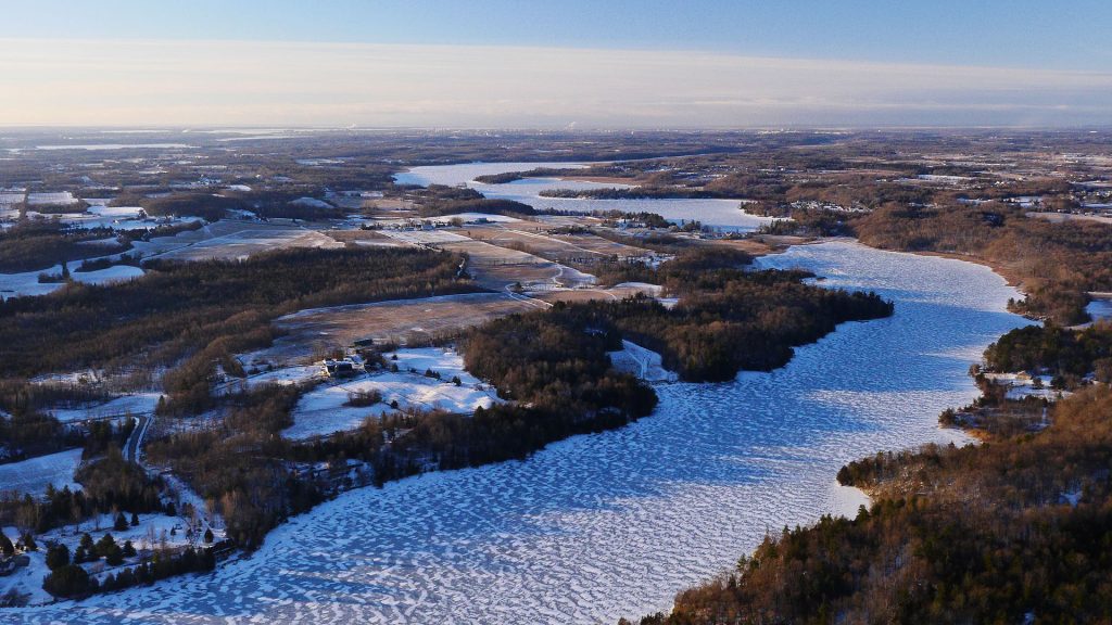 A frozen river from a helicopter.