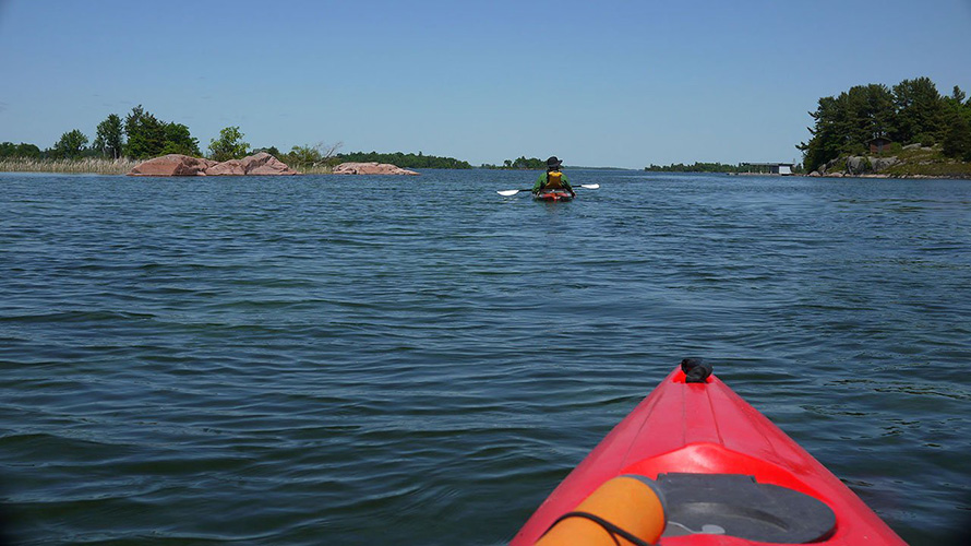 A red kayak in the 1000 Islands.