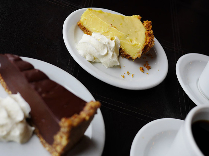 Desserts on white plates.