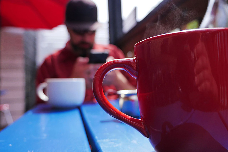 A red coffee cup.