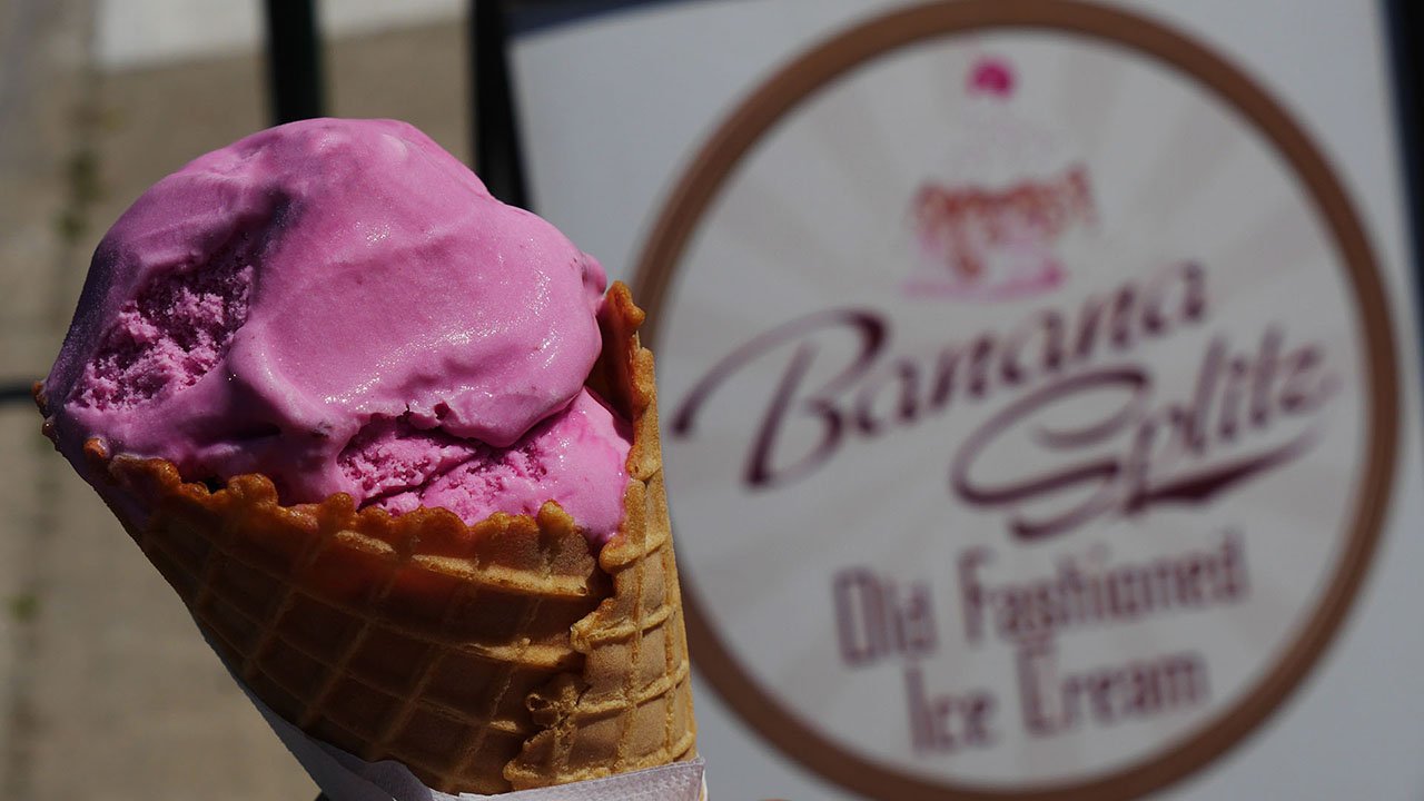 A pink ice cream cone