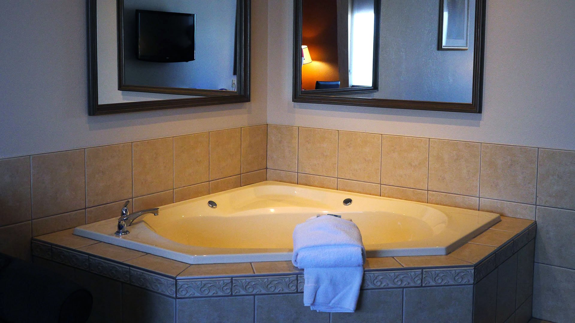 A corner bathtub.