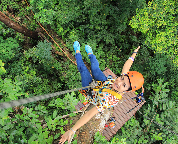 A child treetop trekking